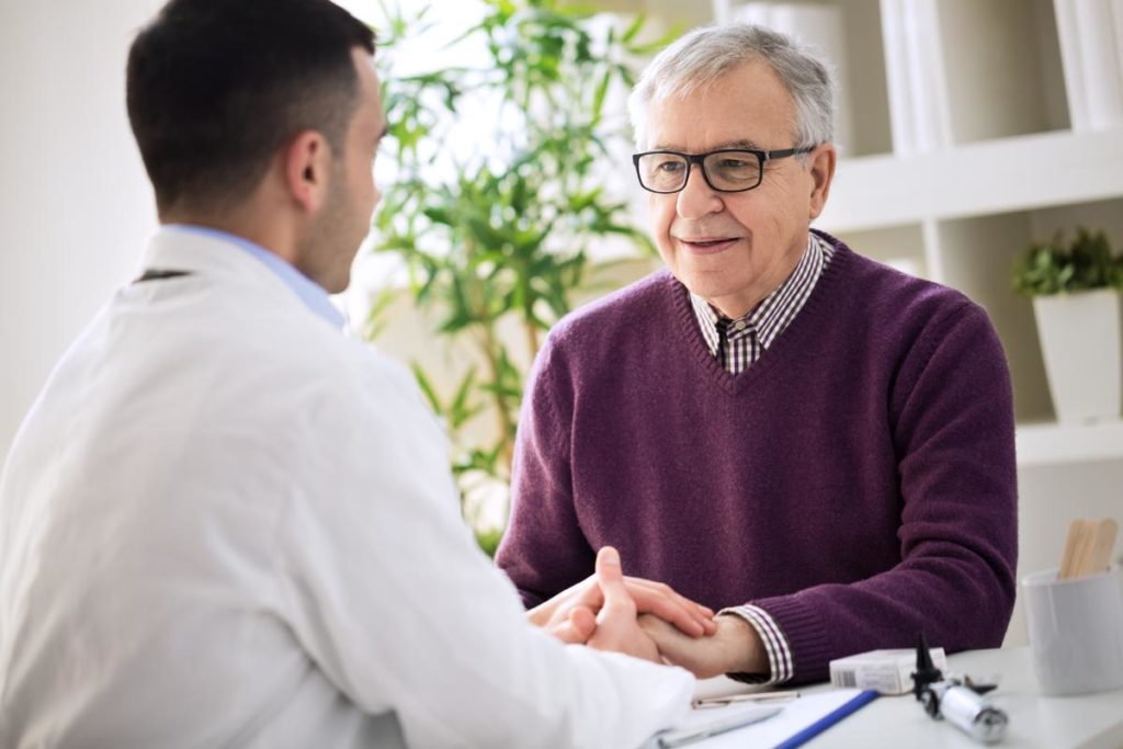 an elderly person talks to a doctor possibly asking is long-term skilled nursing care for me