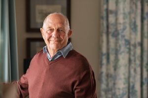 person living comfortably and happily after choosing senior respite care