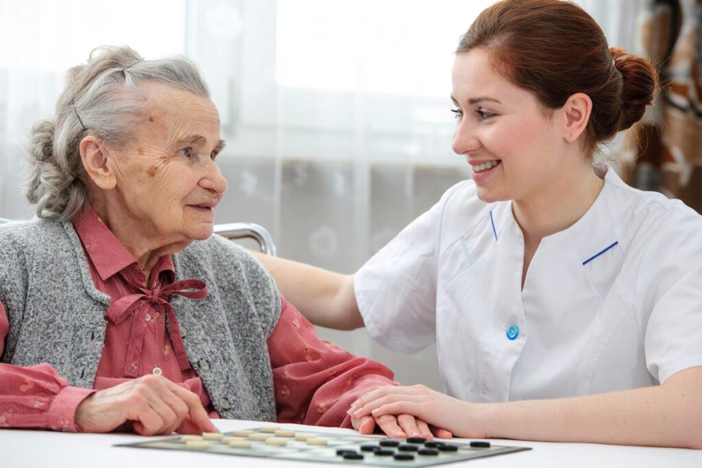 Caregiver and senior woman in the best place for someone with dementia