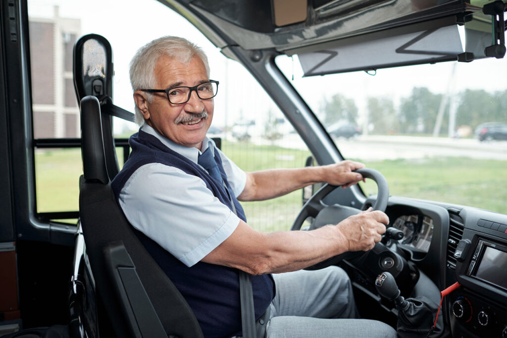 friendly bus driver ready to provide emergency transportation in senior living